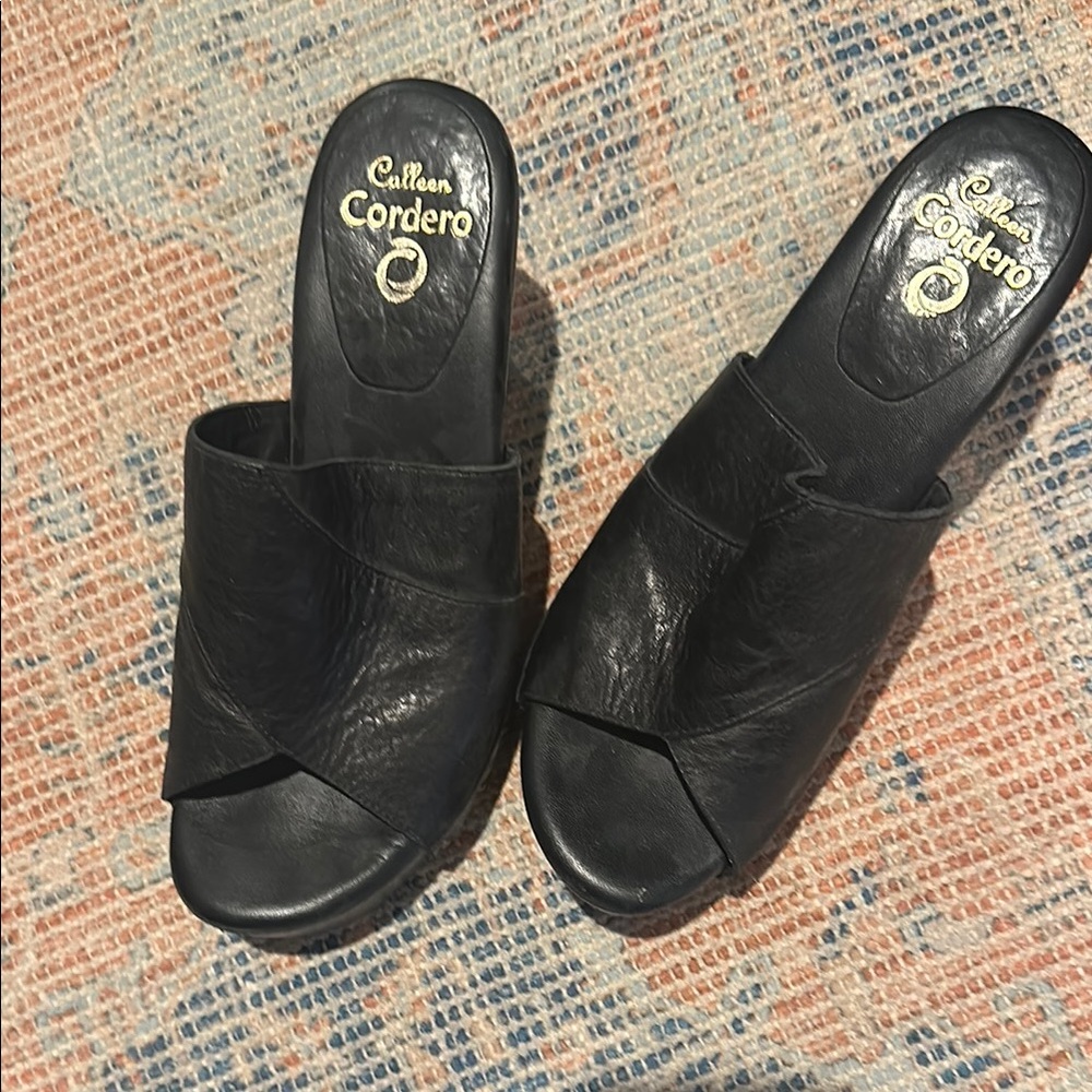 Black Mules with Crisscross Design and Open Toe